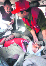 An injured being shifted to Government Medical College and Hospital in Jammu on Tuesday.