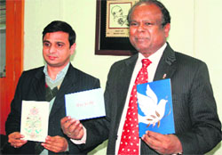 Chief Postmaster General John Samuel launches Greeting Post Service in Jammu on Tuesday.