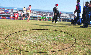 Broken glass lies scattered on the ground on the opening day of the school games at Guru Nanak Stadium in Ludhiana.