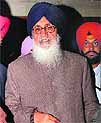 Chief Minister Parkash Singh Badal at the Punjab Vidhan Sabha in Chandigarh; and (right) PCC president Capt Amarinder Singh (centre) along with party legislators hold a protest at the press gallery of the Vidhan Sabha on Tuesday