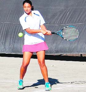 A player in action during the Talent Series Tennis Tournament in Amritsar on Wednesday