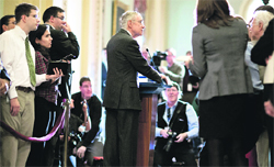 US Senate Majority Leader Harry Reid (Dem-Nevada) speaks to the media after the Democratic policy luncheon on Capitol Hill in Washington, D.C. on Tuesday A deal to avert a "fiscal cliff" of US tax hikes and spending cuts looked closer after House of Representatives Speaker John Boehner kept the support of his Republican colleagues for compromises in talks with President Barack Obama.  Reuters