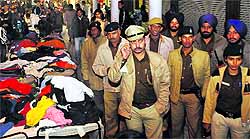 The police patrols the Sector 22 market in Chandigarh on Wednesday