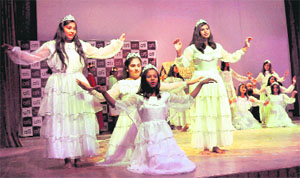 Students perform at a Christmas function organised at St Josephs Academy in Dehradun on Wednesday.
