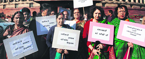 BJP women MPs protest outside Parliament on Wednesday.