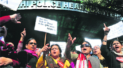 Activists of the All-India Democratic Womens Association (AIDWA) raise slogans outside the police headquarters in New Delhi on Wednesday. Tribune photo: Manas Ranjan Bhui