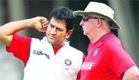 MS Dhoni and coach Duncan Fletcher are facing the heat after Indias surprise defeat to England in the Test series.  File Photo