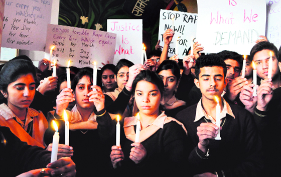 Students of DAV Public School take out a candlelight march in protest against the Delhi gang rape in Amritsar on Thursday.