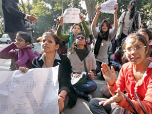 Students shout slogans during a demonstration outside Chief Minister Shiela Dikshits residence to protest against the Vasant Vihar gangrape, in New Delhi on Thursday.
