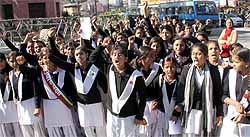Girl students take out a protest march against the Delhi gang-rape incident at Clock Tower in Dehradun on Thursday