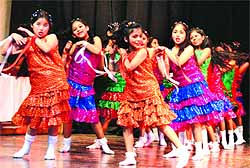 Girl students of Kendriya Vidyalaya, ONGC, perform at the school annual function in Dehradun on Thursday