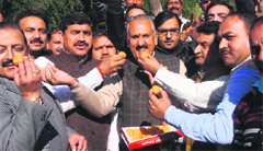 BJP workers in a jubilant mood in Jammu on Thursday. A Tribune photograph