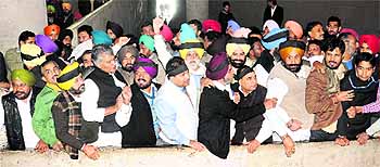 Congress MLAs participate in a protest outside the Speaker's office in the Vidhan Sabha complex on Thursday. They were protesting against the deteriorating law and order situation in Punjab