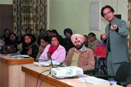 World Health Organization (WHO) surveillance officer Dr Mehtab Singh (extreme right) conducts a workshop at the Civil Hospital in Bathinda on Friday.