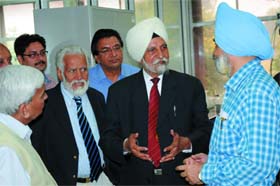 Chancellor of the Central University of Punjab Dr SS Johl (centre) speaking to vice-chancellor Prof (Dr) Jai Rup Singh during his first visit to the univesity in November.