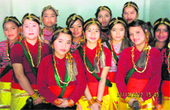 Students of Kendriya Vidyalaya, Birpur, prepare to perform a Nepali dance on their annual day function in Dehradun on Friday. 