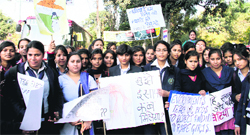 Students from different local colleges protest against the New Delhi rape case in Dehradun on Friday. Tribune photo: Vinod Pundir