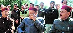 PK Dhumal with party legislators at his residence Oak Over in Shimla on Friday