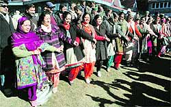 Virbhadra Singhs wife Pratibha Singh (in front) dances with party supporters at Holly Lodge in Shimla on Friday