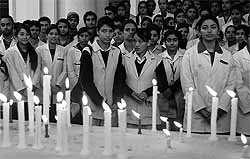 Paramedic, nursing and medical students of the DRPGMC, Tanda, take out a candlelight march on Thursday