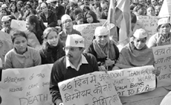 Arvind Kejriwal and Aam Aadmi Party supporters hold a dharna against the recent gang rape, at Jantar Mantar in New Delhi on Friday. Tribune photo: Manas Ranjan Bhui