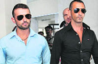 Italian marines Massimiliano Latore (R) and Salvatore Girone come out of the office of the police commissioner in Kochi on Thursday.  PTI