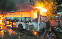 Buses set ablaze in Alexandria on Friday.  AFP 
