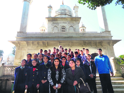 Students of Universal Academy during a heritage walk to Guru Ram Rai Darbar organised by SpicMacay in Dehradun on Saturday.