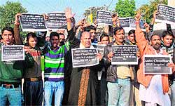 Activists of the Dogra Front and the state unit of Shiv Sena protest against the state government in Jammu on Saturday