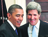 John Kerry (R) with Barack Obama in Washington on Friday. AFP