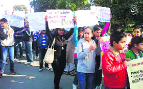 Young volunteers protest against the New Delhi rape case as part of a campaign organised by MAD, a youth organisation, at Gandhi Park in Dehradun on Sunday.