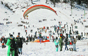 Christmas and New Year Eve revellers at the ski resort in Solang.