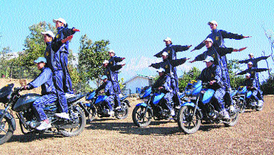 Himachal women police personnel practise on bikes at Saloh near Dharamsala on Saturday. 