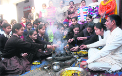 Students of Lala Hans Raj Memorial Model School pray for the Delhi gang-rape victim in Jalandhar on Saturday. 