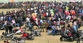 Bikers throng the Maulana Azad Stadium to take part in a rally to raise awareness about road safety norms in Jammu on Sunday.
