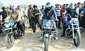 Bikers throng the Maulana Azad Stadium to take part in a rally to raise awareness about road safety norms in Jammu on Sunday.
