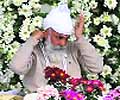 Satguru Uday Singh ties the turban presented to him by the Namdhari Darbar at Bhaini Sahib on Sunday