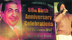 A singer performs at a function to mark the birth anniversary of legendary singer Mohd Rafi in Amritsar on Monday. Photo: Sameer Sehgal
