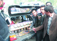Students of Swami Vivekanand College of Engineering and Technology explain the working of the water car, in Bathinda on Monday. Tribune photo: Pawan Sharma