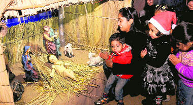 People celebrate the birth of Jesus Christ at the Sector 19 church in Chandigarh. 