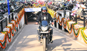 A motorcyclist comes out from the newly inaugurated basement parking at Sector 17, Chandigarh, on Monday. 
