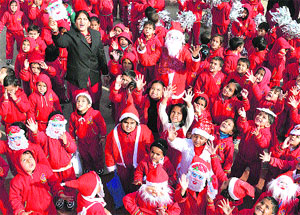 Students of DAV Centenary Public School celebrate Christmas in Mandi on Monday. 