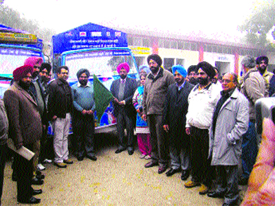 Additional Deputy Commissioner Kulbir Singh flags off a van to create awareness among the residents on the arrival of Red Ribbon Express train coming on December 29 and 30. 