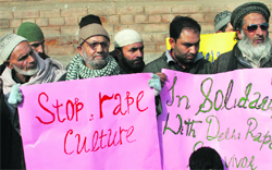 People protest against the Delhi gang rape incident in Srinagar on Monday. Photo: Amin War