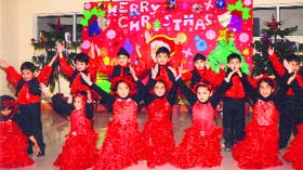 Children of Bal Bharati Public School celebrate Christmas on the school premises in Ludhiana on Monday