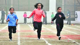 Students take part in a race during the annual athletics meet at KVM School in Ludhiana on Monday