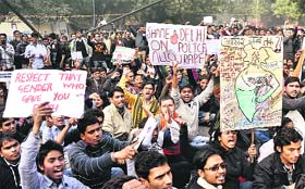 Demonstrators raise slogans during a protest at Jantar Mantar in New Delhi on Monday