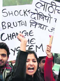 Rallying for justice: Youngsters hold a protest march against Delhi gang rape in Jalandhar on Monday