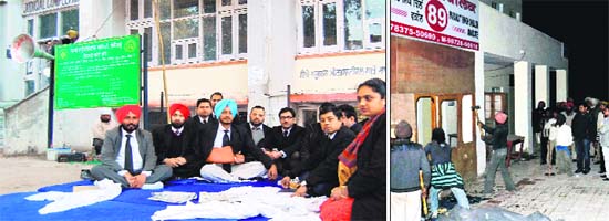 Lawyers during a hunger strike at district courts complex in Amritsar in February. Illegal chambers being demolished by the district administration in December