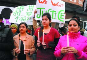 Residents took out a candlelight procession in the city on Tuesday to protest against the gang-rape that took place in Delhi recently